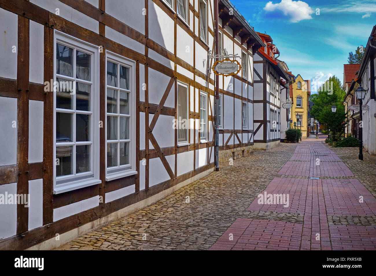 Historical city center and traditional houses of Hameln/Hamelin, Germany during sunny weather