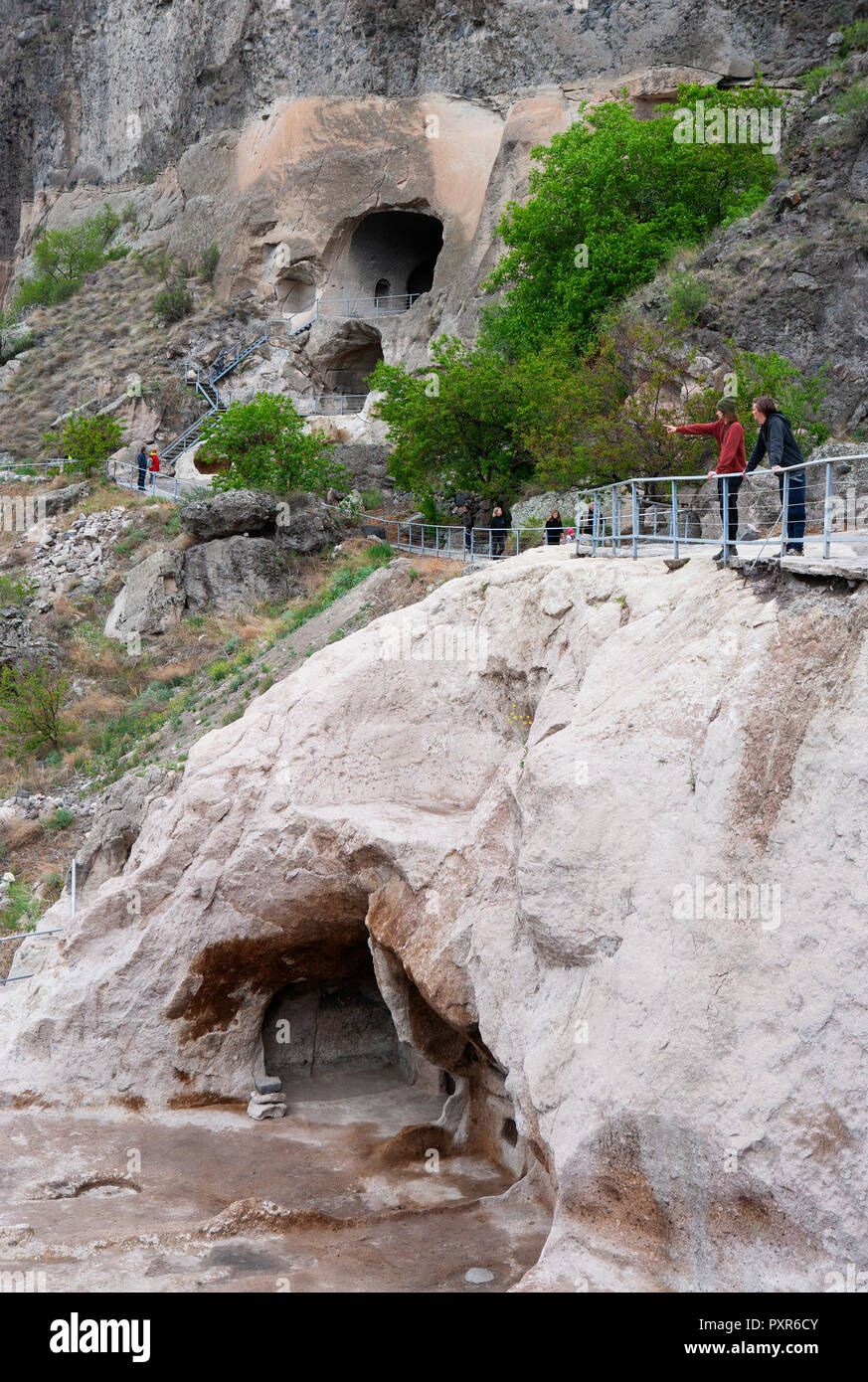 Georgia, Samtskhe-Javakheti, Tourists at cave city Vardzia Stock Photo