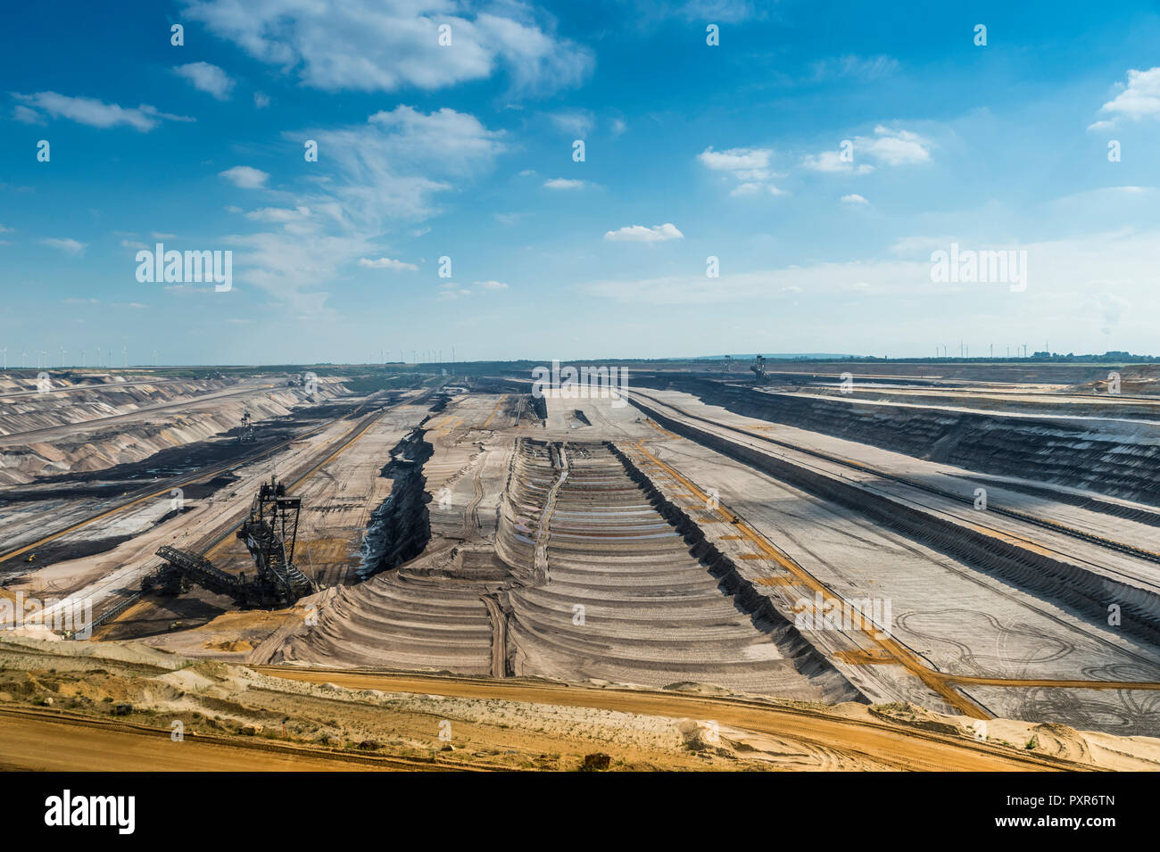 Germany, Garzweiler surface mine, layers and giant excavator Stock Photo