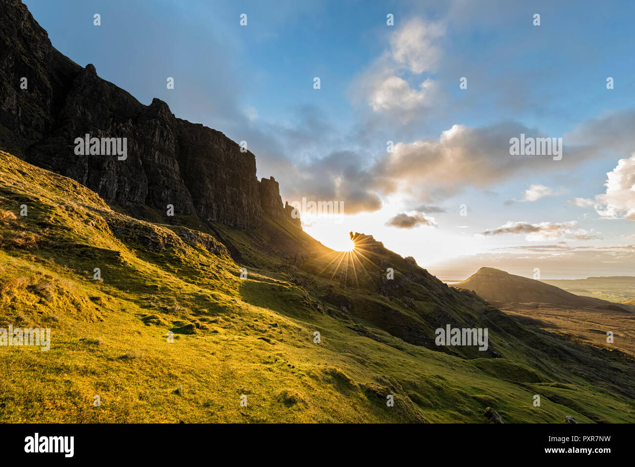 UK, Scotland, Inner Hebrides, Isle of Skye, Trotternish, Quiraing, sunrise at The Prison and Meall na Suiramach Stock Photo