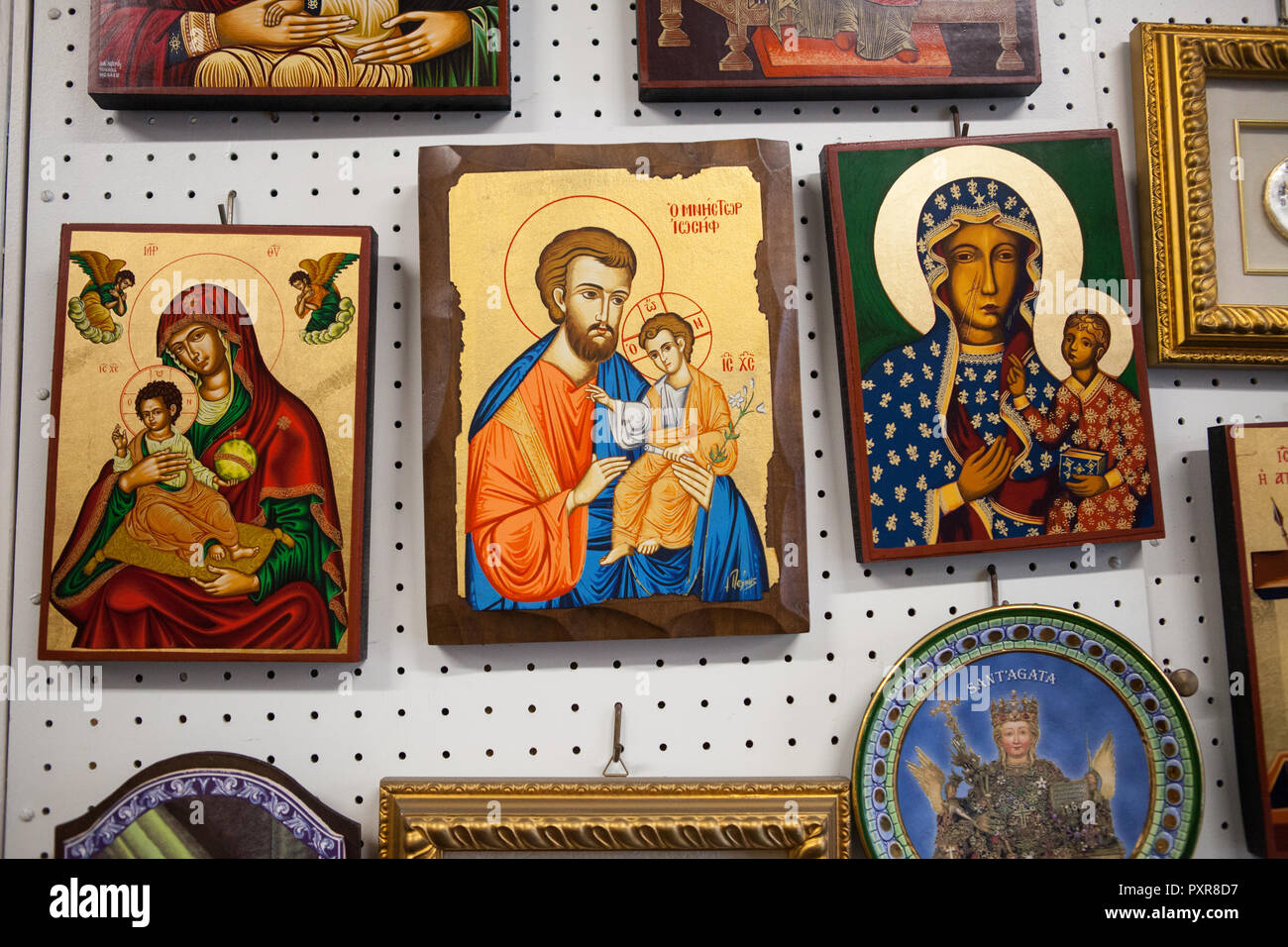Relgious paintings and icons for sale in Catania, Italy Stock Photo