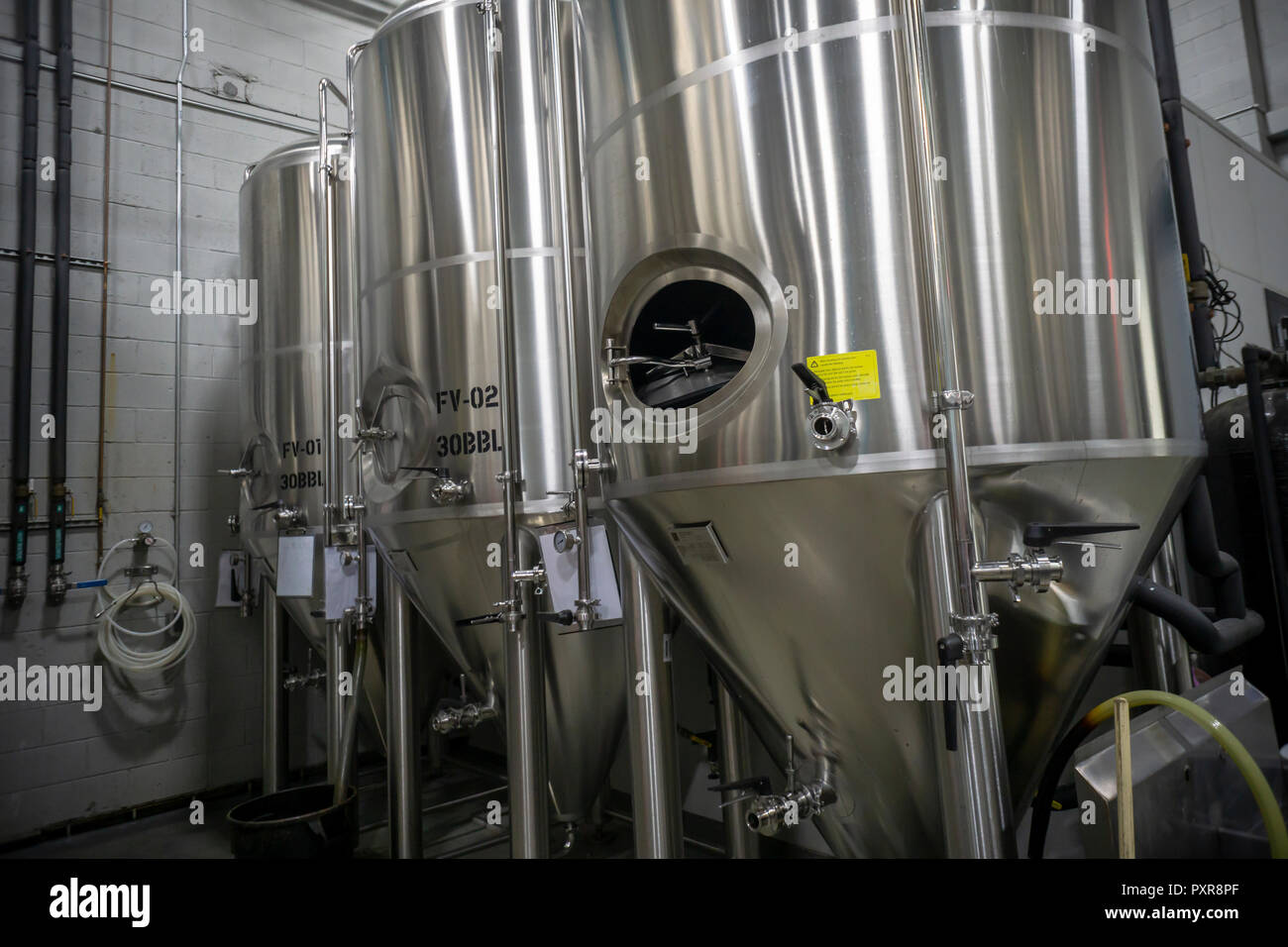 The brewing kettles of the Five Boroughs Brewing Co. in Brooklyn in New York on Sunday, October 14, 2018. A recent report published in 'Nature Plants' contends that a warming climate may give rise to a shortage of barley, resulting is steep price hikes. (© Richard B. Levine) Stock Photo