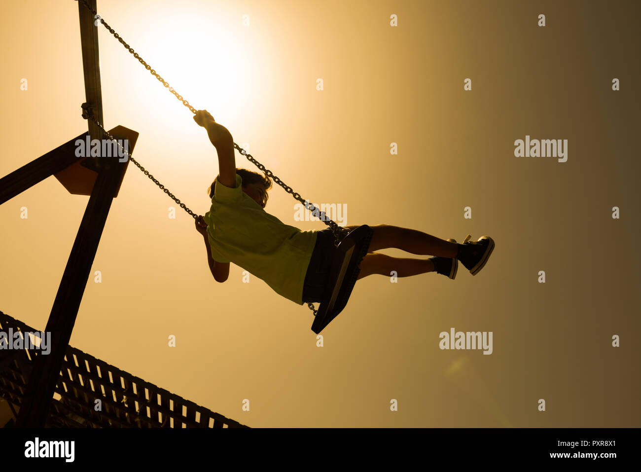 child-swinging-legs-hi-res-stock-photography-and-images-alamy