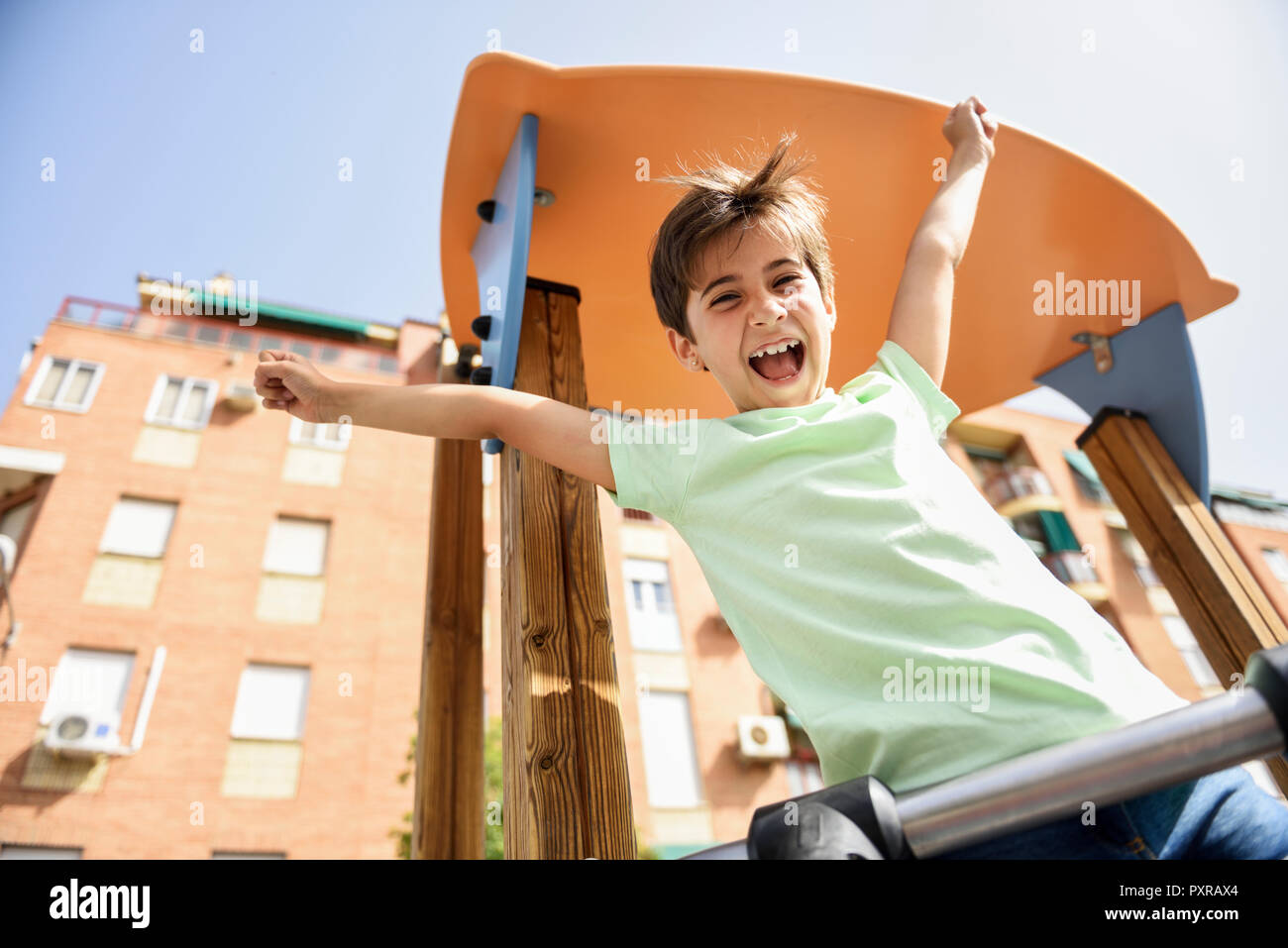 Portrait of happy little girl on playground Stock Photo - Alamy