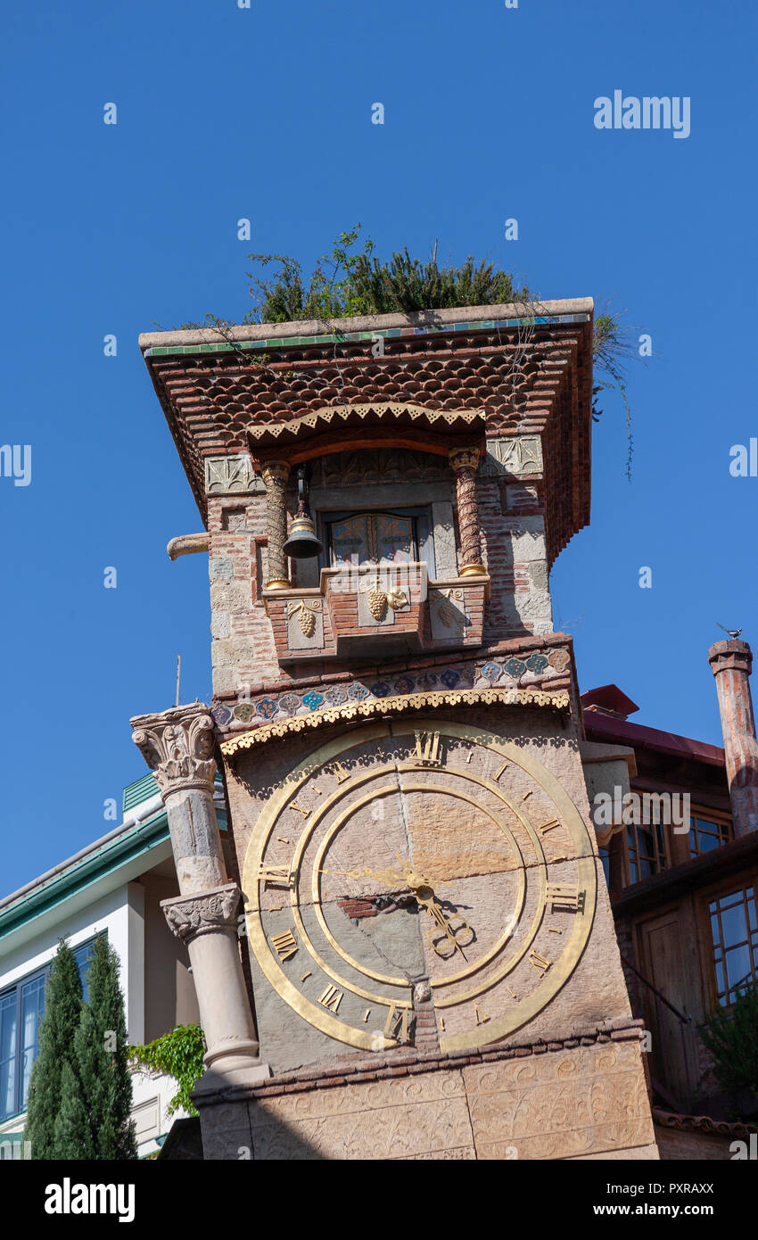 Georgia, Tbilisi, Clock tower of the puppet theater Gabriadze Stock Photo