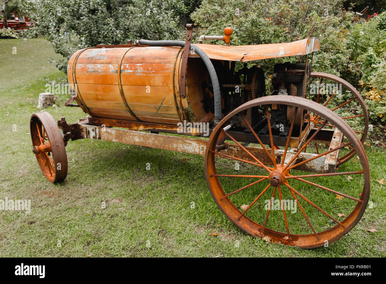 Antique Carriage With Sprayer Pump - orchard equipment Stock Photo