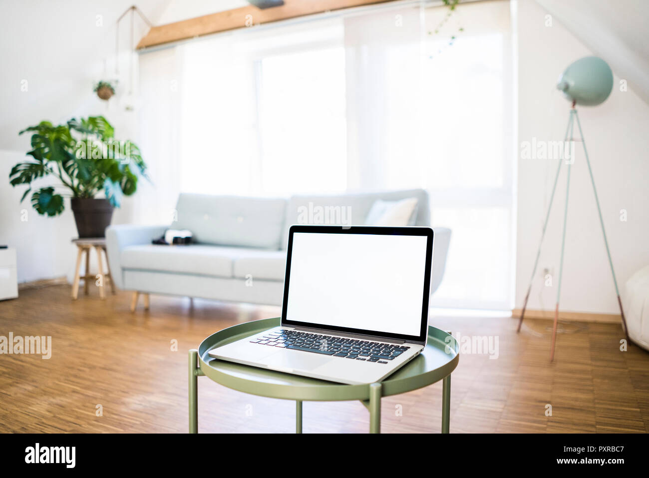 Laptop on table at home Stock Photo