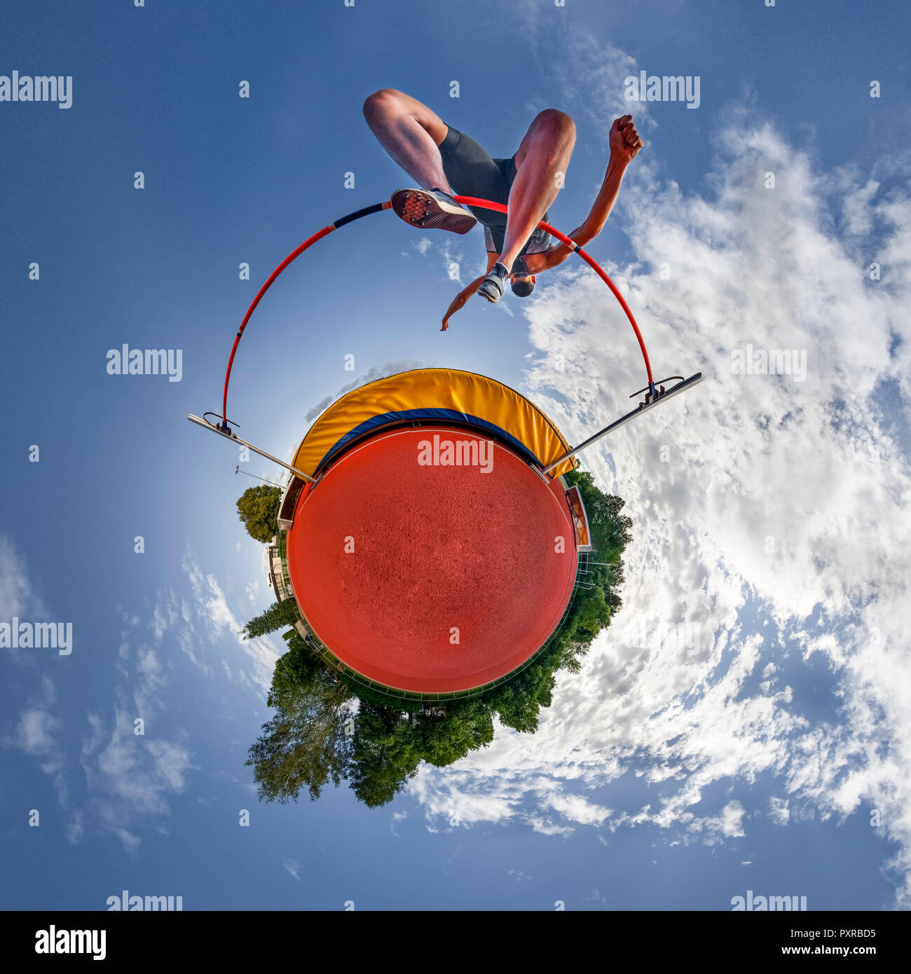 High jumper, little planet view Stock Photo