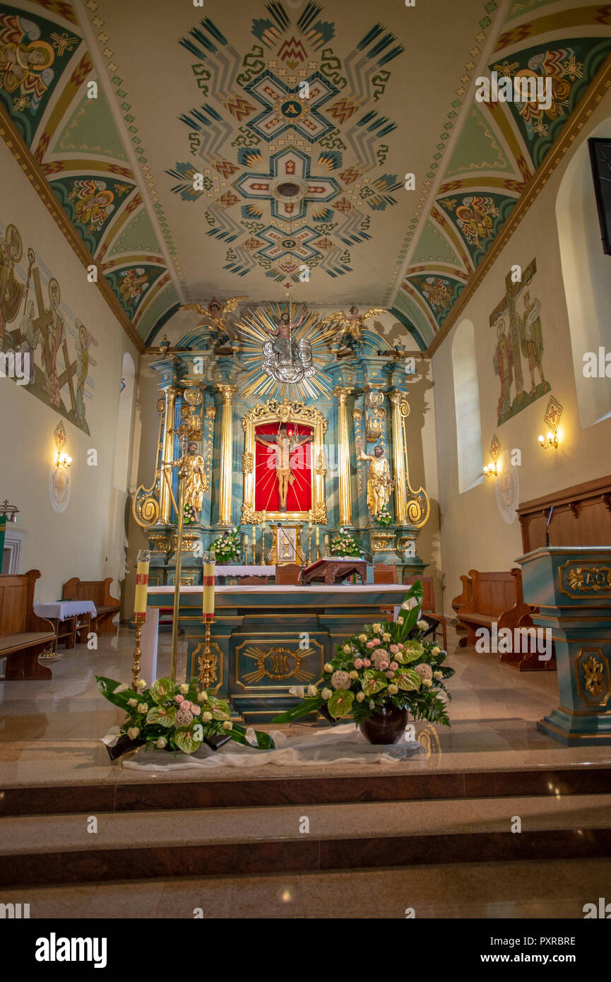 Ornately decorated altar located in the sanctuary of Catholic Church