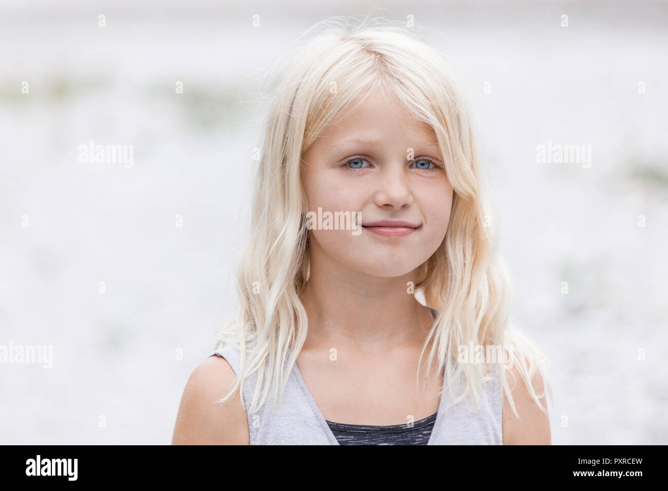Portrait of smiling girl outdoors Stock Photo - Alamy