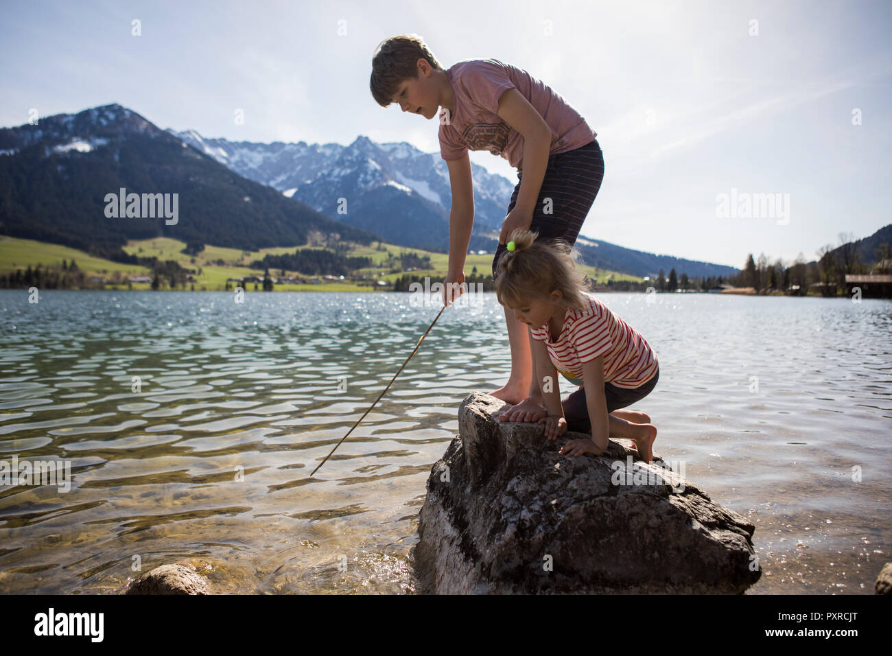 Brother sister playing lake hi-res stock photography and images - Alamy