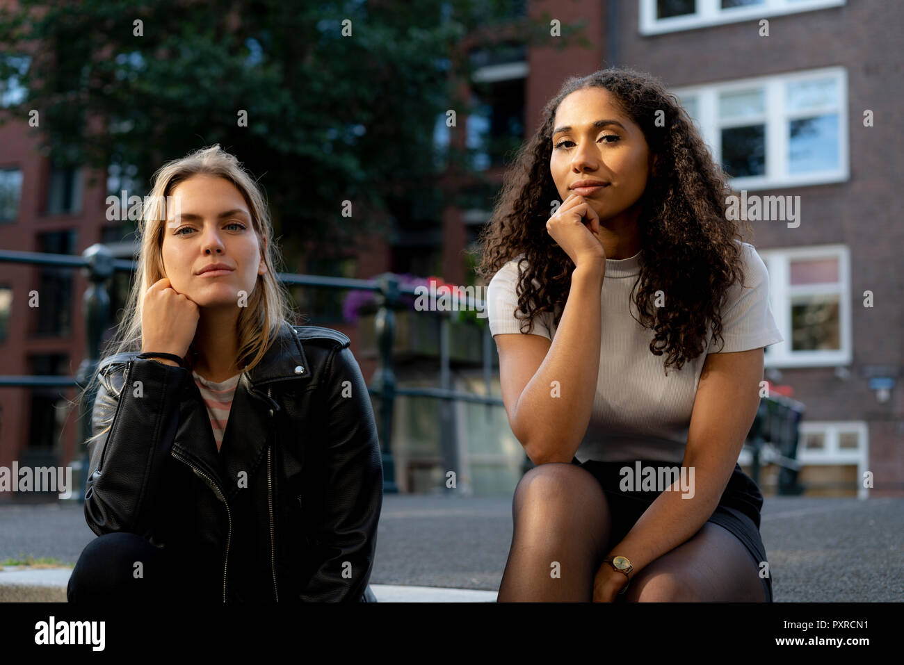 Two girlfriends on a city break in Amsterdam, Netherlands Stock Photo