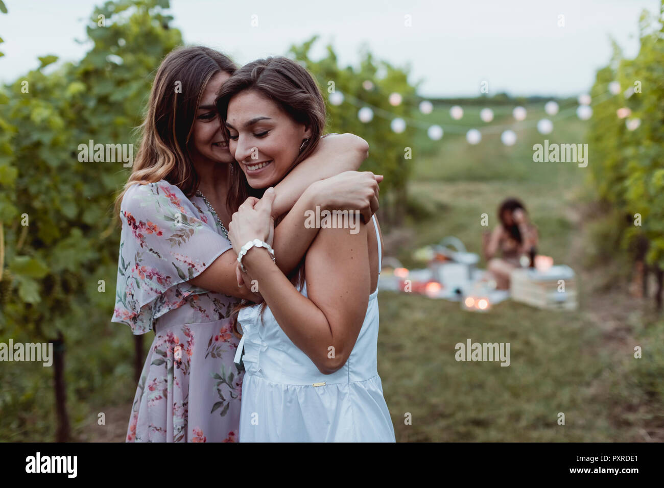 Premium Photo | Some interesting content in their phones. sharing with  secrets. two sisters twins standing and posing