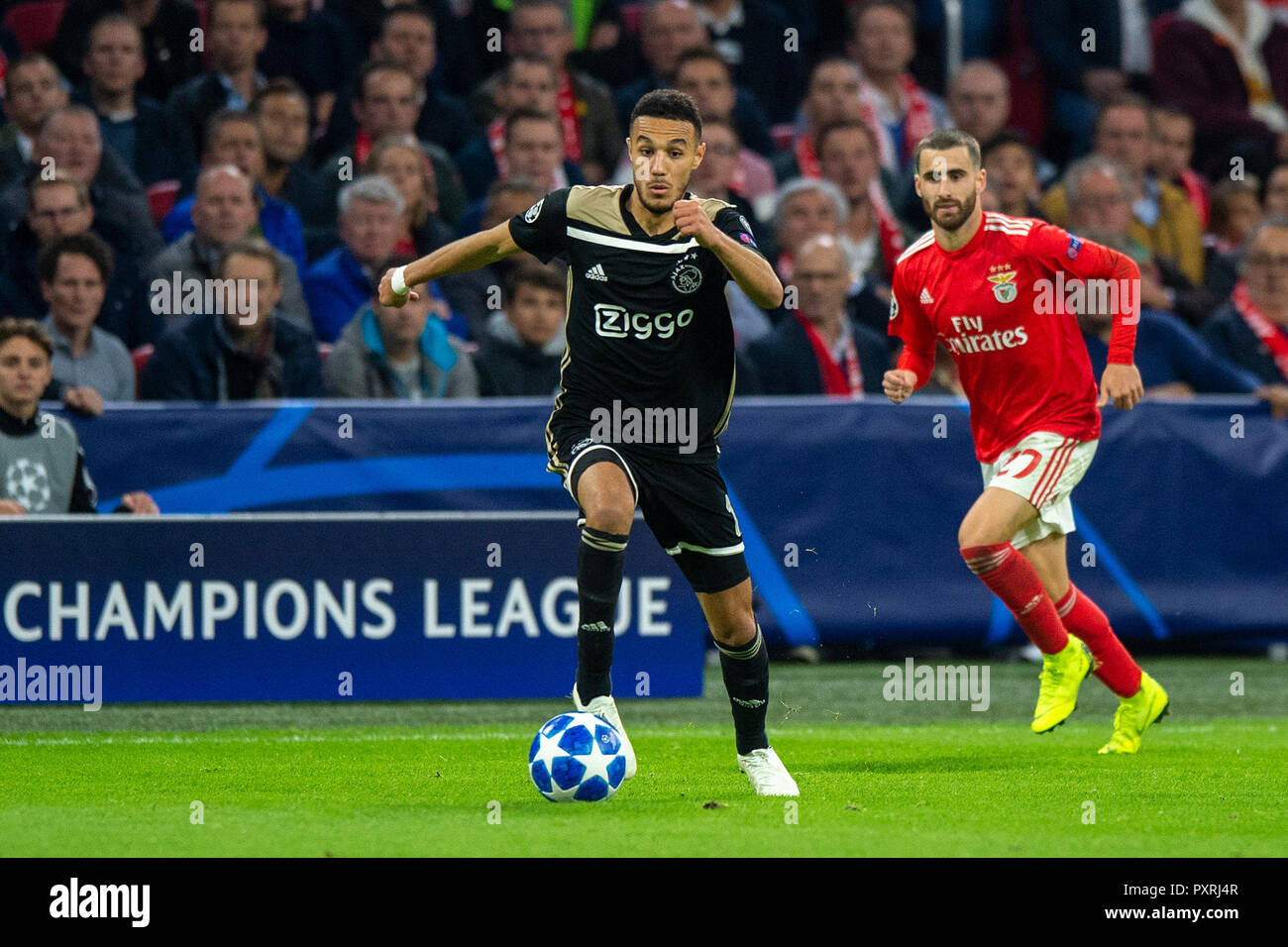 Amsterdam, Netherlands. 23rd October, 2018. 23-10-2018: Voetbal: Ajax v Benfica: Amsterdam Champions League 2018-2019 Noussair Mazraoui of Ajax, Rafa Silva of Benfica Credit: Orange Pictures/Alamy Live News Stock Photo