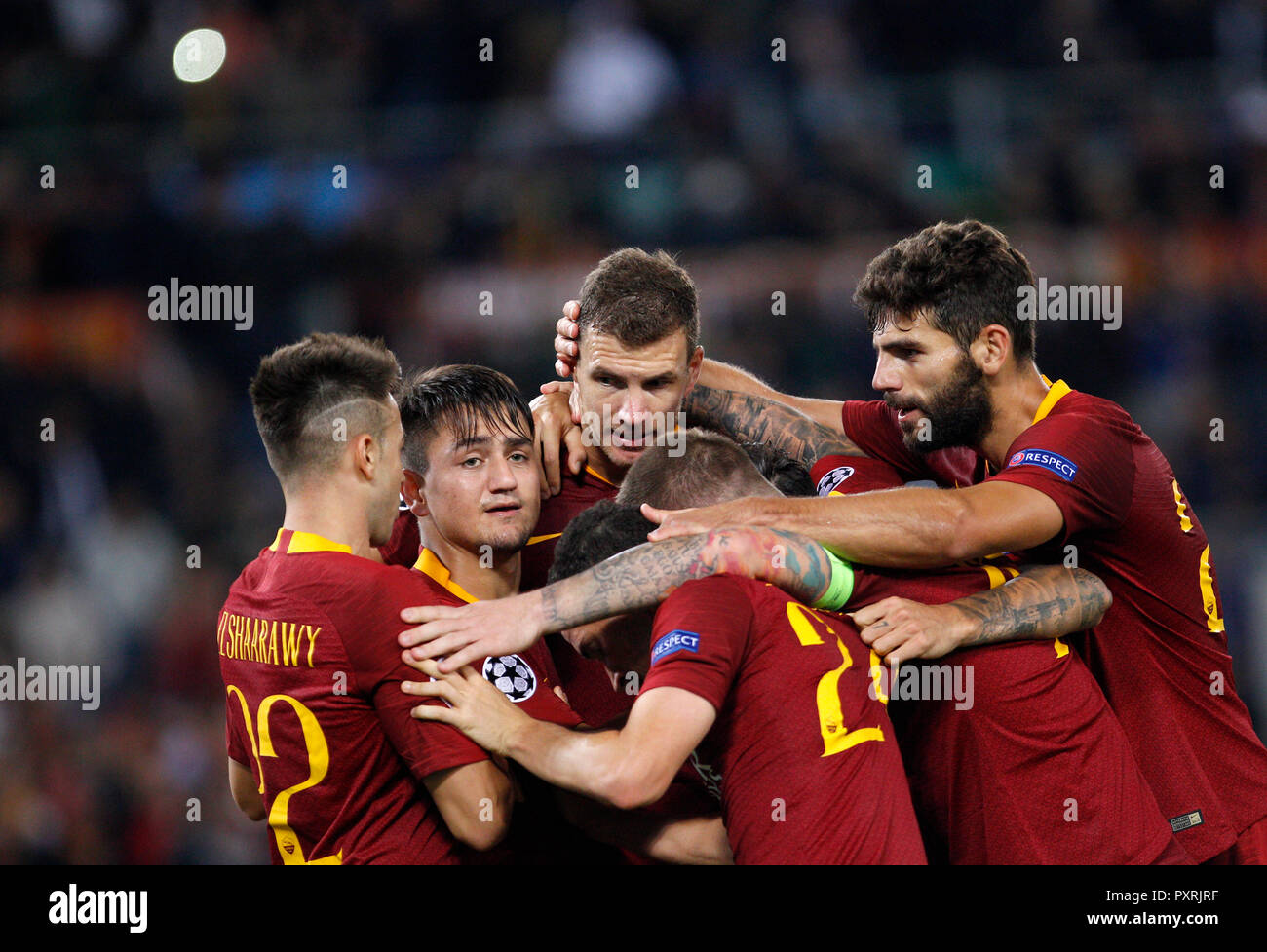 Rome, Italy, 23rd October, 2018. Roma's Edin Dzeko, third from left, celebrates with his teammates after scoring his second goal during the Champions League Group G soccer match between Roma and CSKA Moscow at the Olympic Stadium. Roma won 3-0. © Riccardo De Luca UPDATE IMAGES/ Alamy Live News Stock Photo