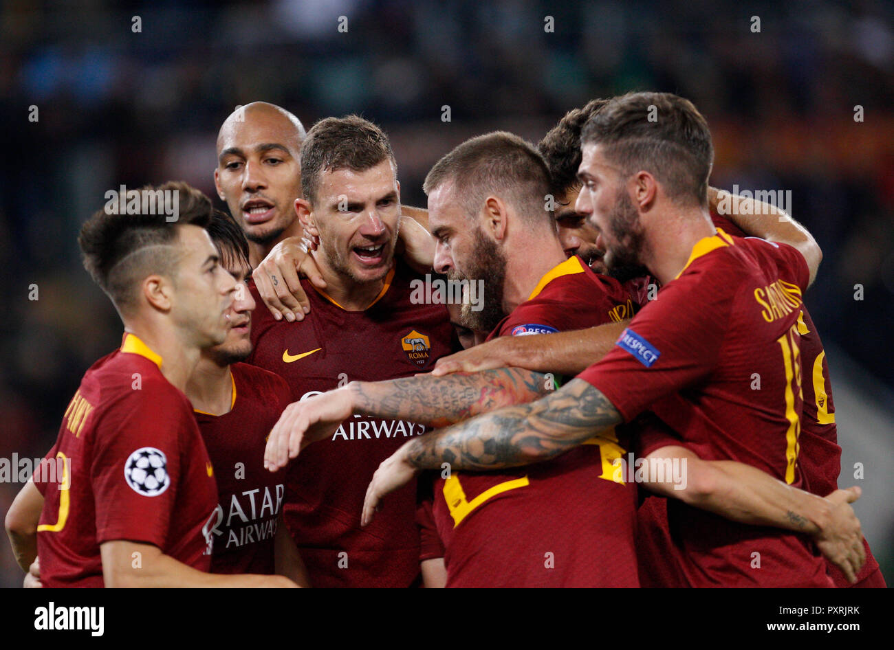 Rome, Italy, 23rd October, 2018. Roma's Edin Dzeko, fourth from left, celebrates with his teammates after scoring his second goal during the Champions League Group G soccer match between Roma and CSKA Moscow at the Olympic Stadium. Roma won 3-0. © Riccardo De Luca UPDATE IMAGES/ Alamy Live News Stock Photo