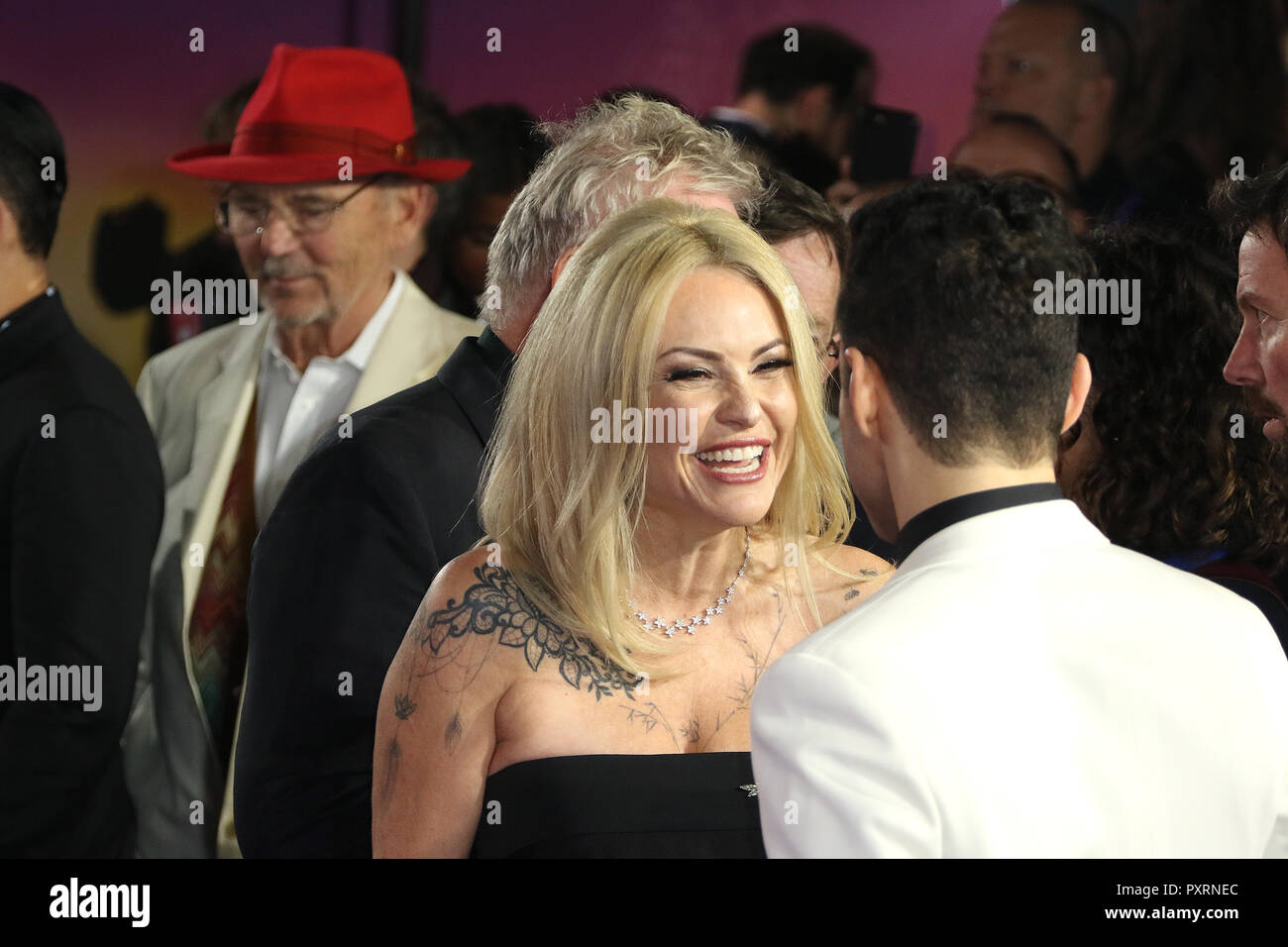 London, UK. 23rd October, 2018. Roger Taylor, Sarina Potgieter, Rami