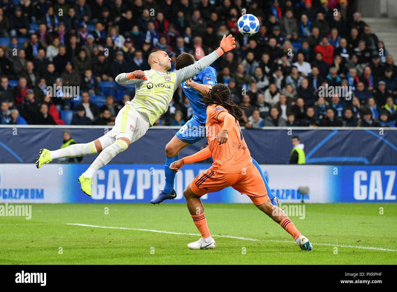 Hoffenheim, Germany. 23rd Oct, 2018. Anthony Lopes (L), goalkeeper of Lyon fights for the ball during the UEFA Champions League group F match between Hoffenheim and Lyon at Rhein-Neckar-Arena in Sinsheim, Germany, on Oct. 23, 2018. The match ended 3-3. Credit: Ulrich Hufnagel/Xinhua/Alamy Live News Stock Photo