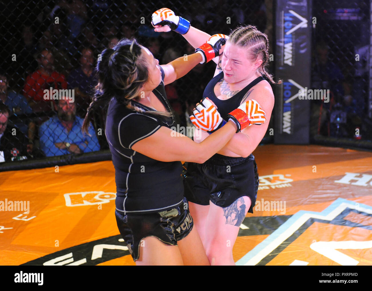 October 20, 2018: MMA fighter, Cameron Pollard (right), with the roundhouse  punch to Toni Tallman (left), during V3 FIGHTS 70 at the Fitz Casino in  Tunica, MS. Pollard defeated Tallman to win