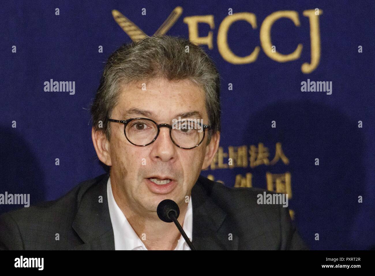 Tokyo, Japan. 24th Oct, 2018. Andre Calantzopoulos CEO of Philip Morris International Inc. speaks during a news conference at The Foreign Correspondents' Club of Japan in Tokyo. Calantzopoulos came to the Club to speak about e-cigarettes and other alternatives into the Japanese market, which regulations have accompanied a 20 percent reduction in cigarette consumption in the past three years. On Tuesday, Philip Morris International Inc. has showcased its new ''IQOS 3'' products, a low-cost version of its IQOS ''heat not burn'' products, which emit less smell and smoke than conventional ciga Stock Photo