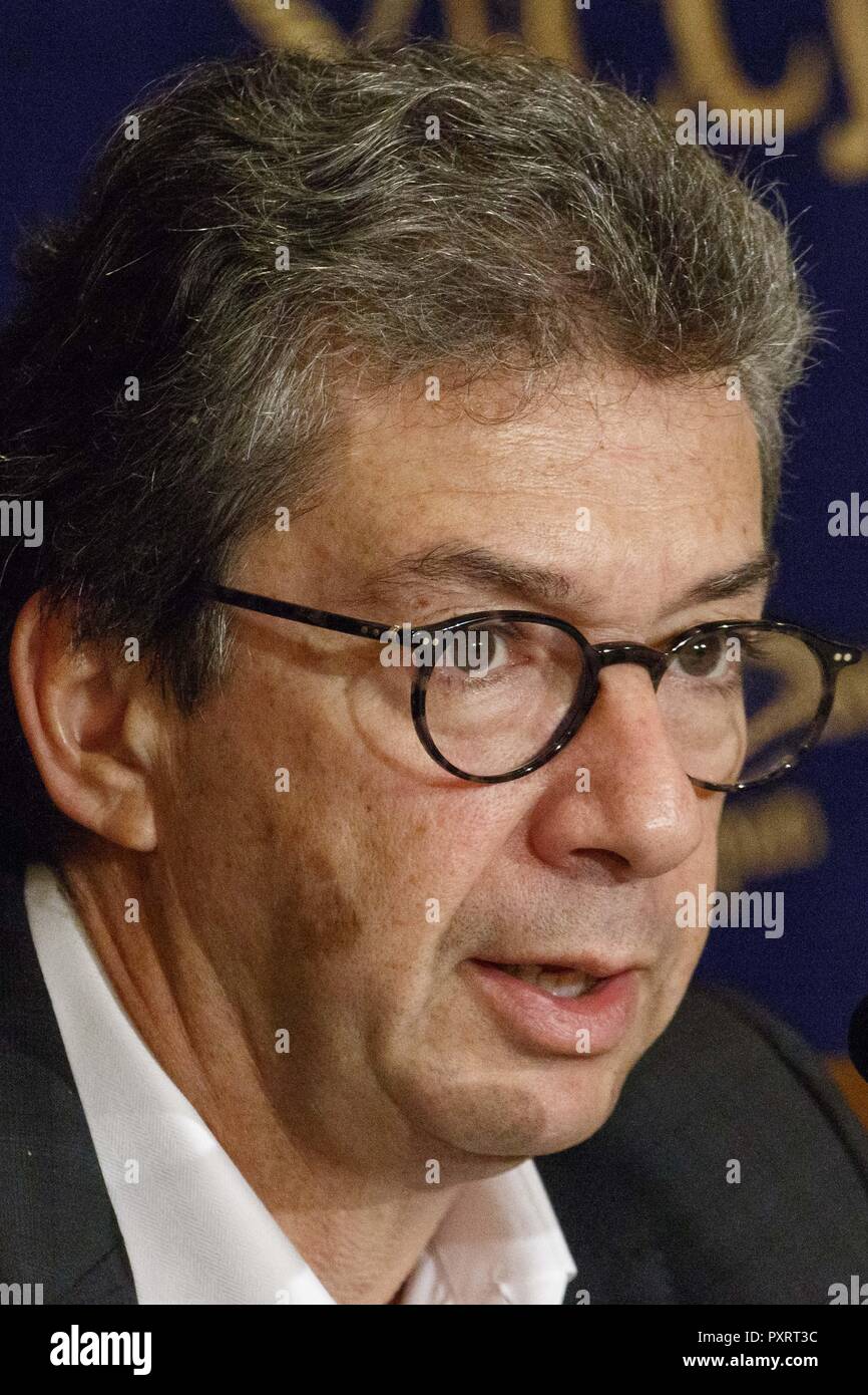 Tokyo, Japan. 24th Oct, 2018. Andre Calantzopoulos CEO of Philip Morris International Inc. speaks during a news conference at The Foreign Correspondents' Club of Japan in Tokyo. Calantzopoulos came to the Club to speak about e-cigarettes and other alternatives into the Japanese market, which regulations have accompanied a 20 percent reduction in cigarette consumption in the past three years. On Tuesday, Philip Morris International Inc. has showcased its new ''IQOS 3'' products, a low-cost version of its IQOS ''heat not burn'' products, which emit less smell and smoke than conventional ciga Stock Photo