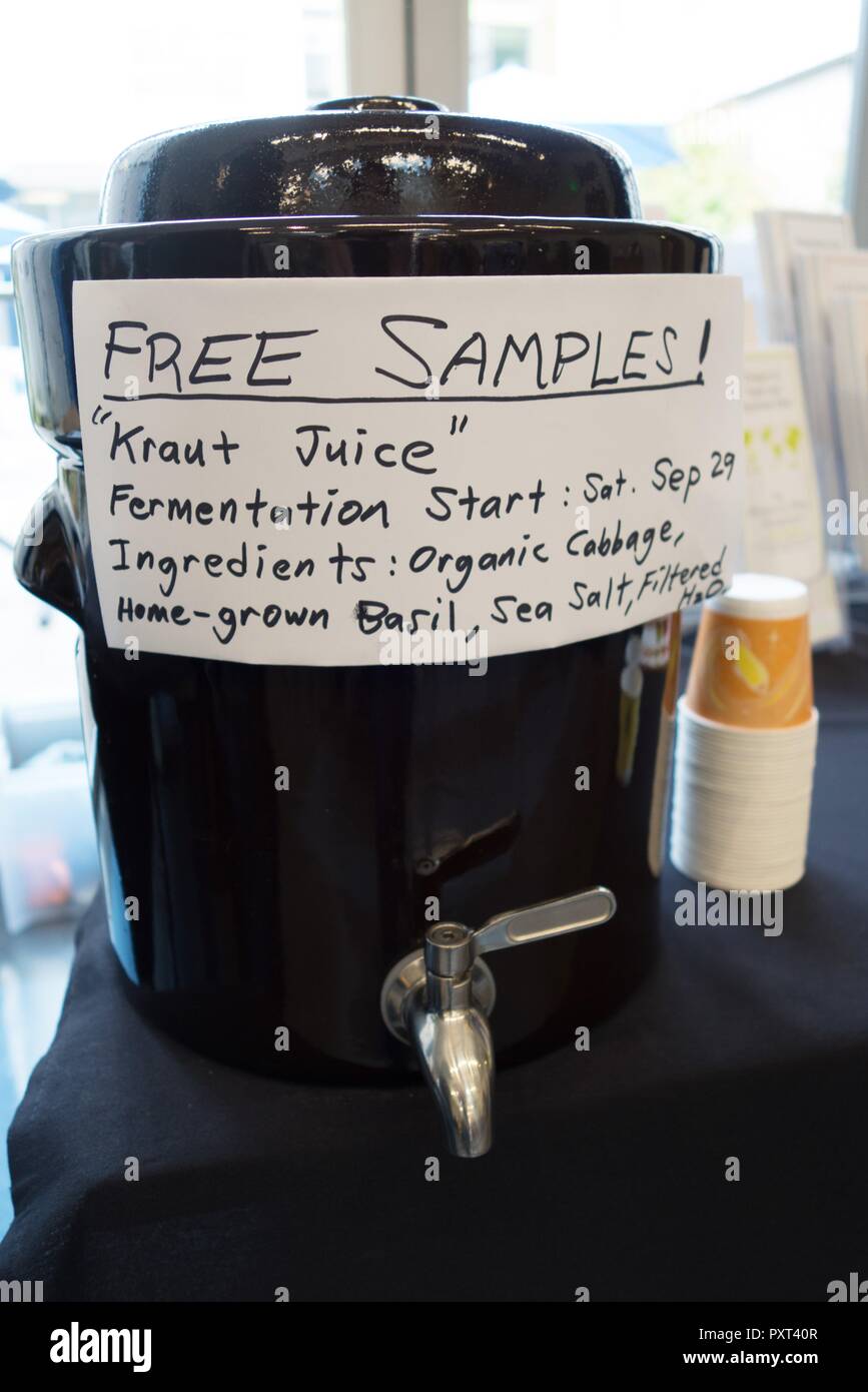 A dispenser for free samples of kraut juice, at the Fun with Fermentation Festival in Eugene, Oregon, USA. Stock Photo
