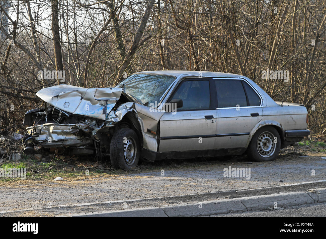 Crushed car in front collision traffic accident Stock Photo Alamy