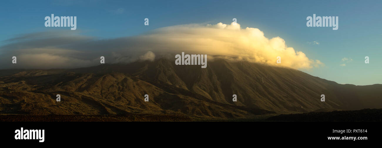 Passat cloud covers summit of volcano Pico del Teide, Teide National Park, Tenerife, Canary Islands, Spain Stock Photo