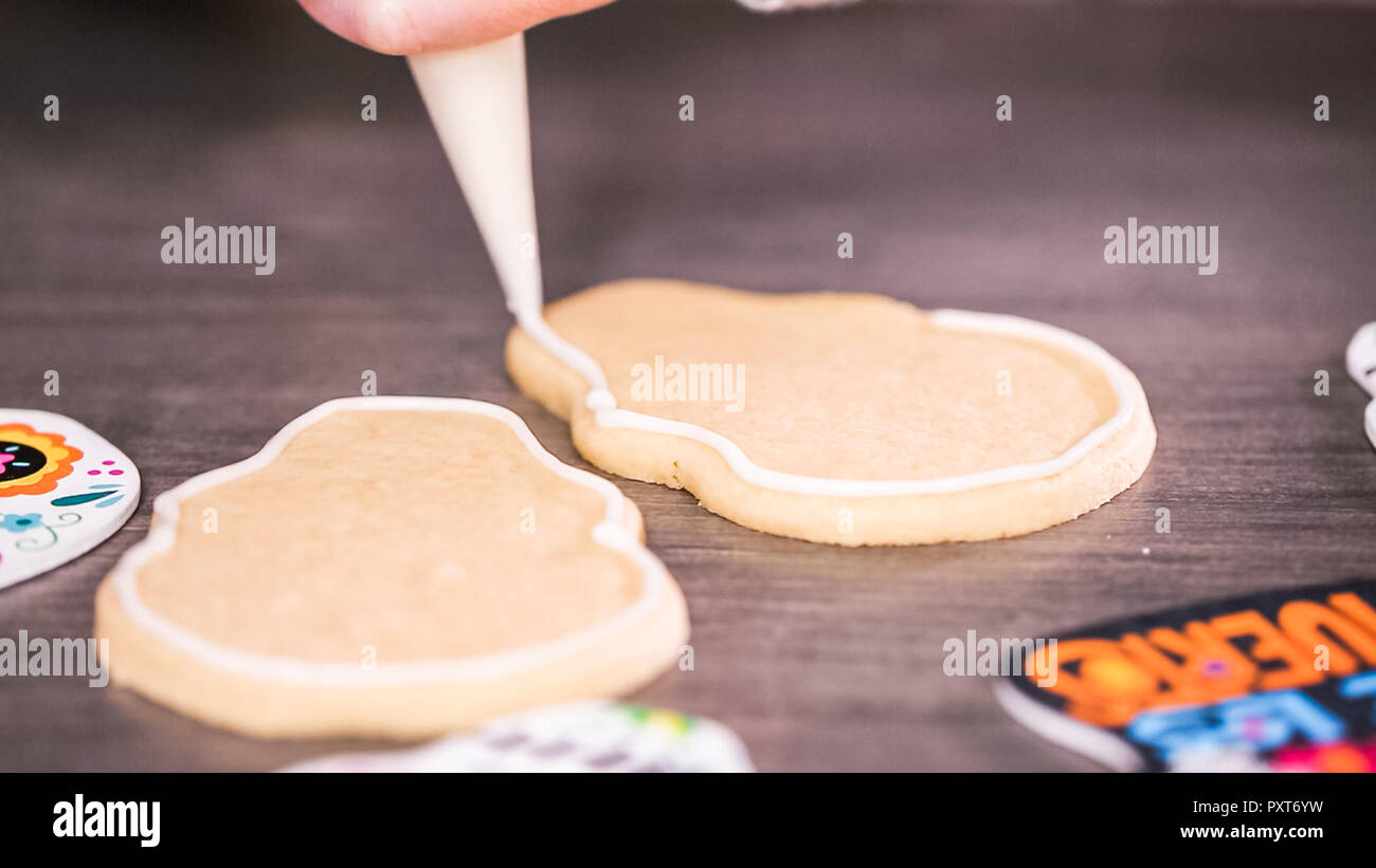 Step by step. Creating edge for flooding sugar skull cookie with royal