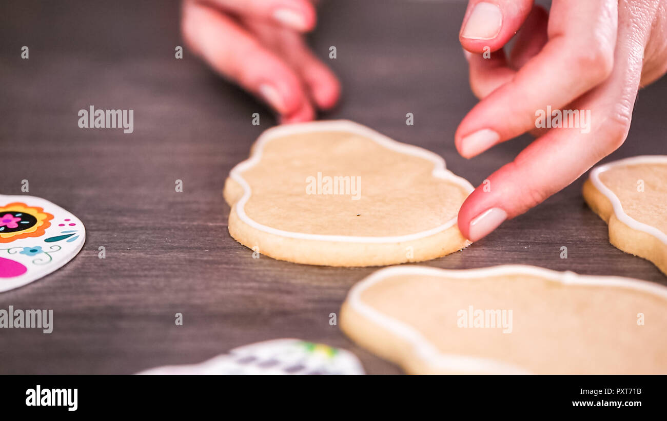 Step by step. Creating edge for flooding sugar skull cookie with royal