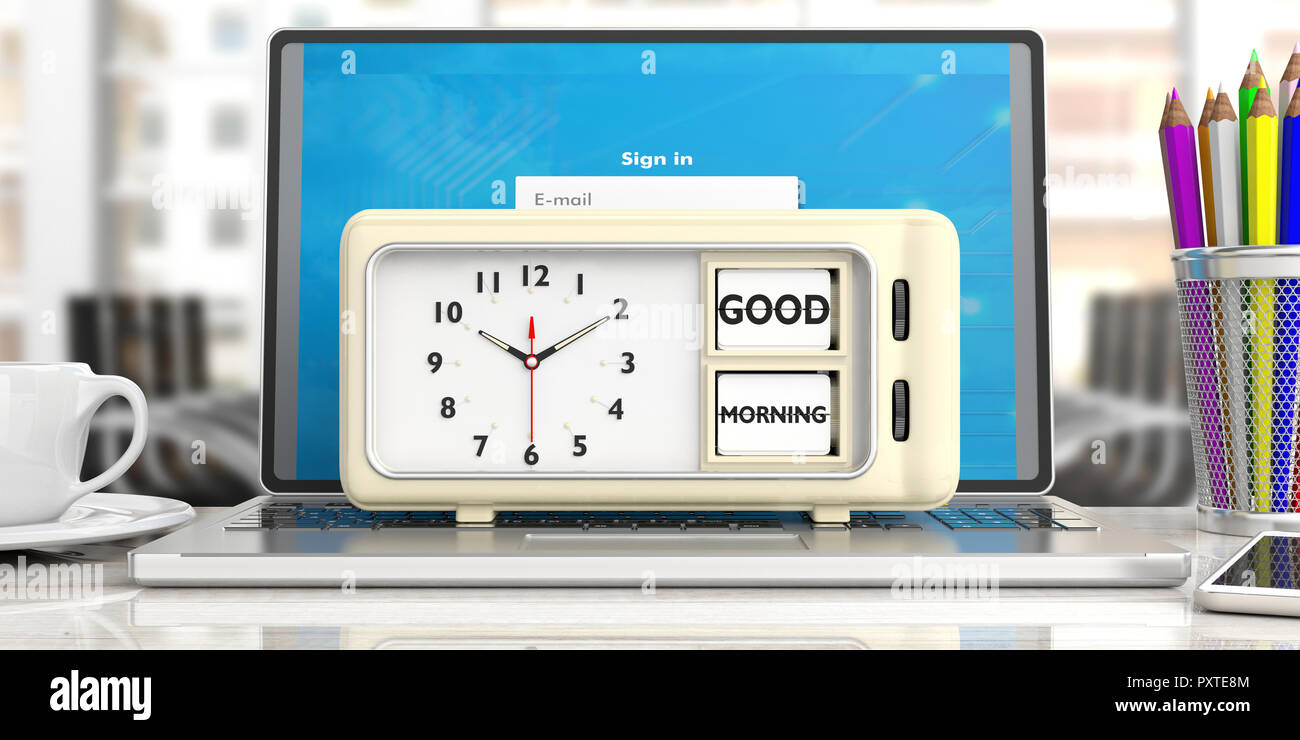 Good morning wake up message on retro vintage alarm clock on computer ...