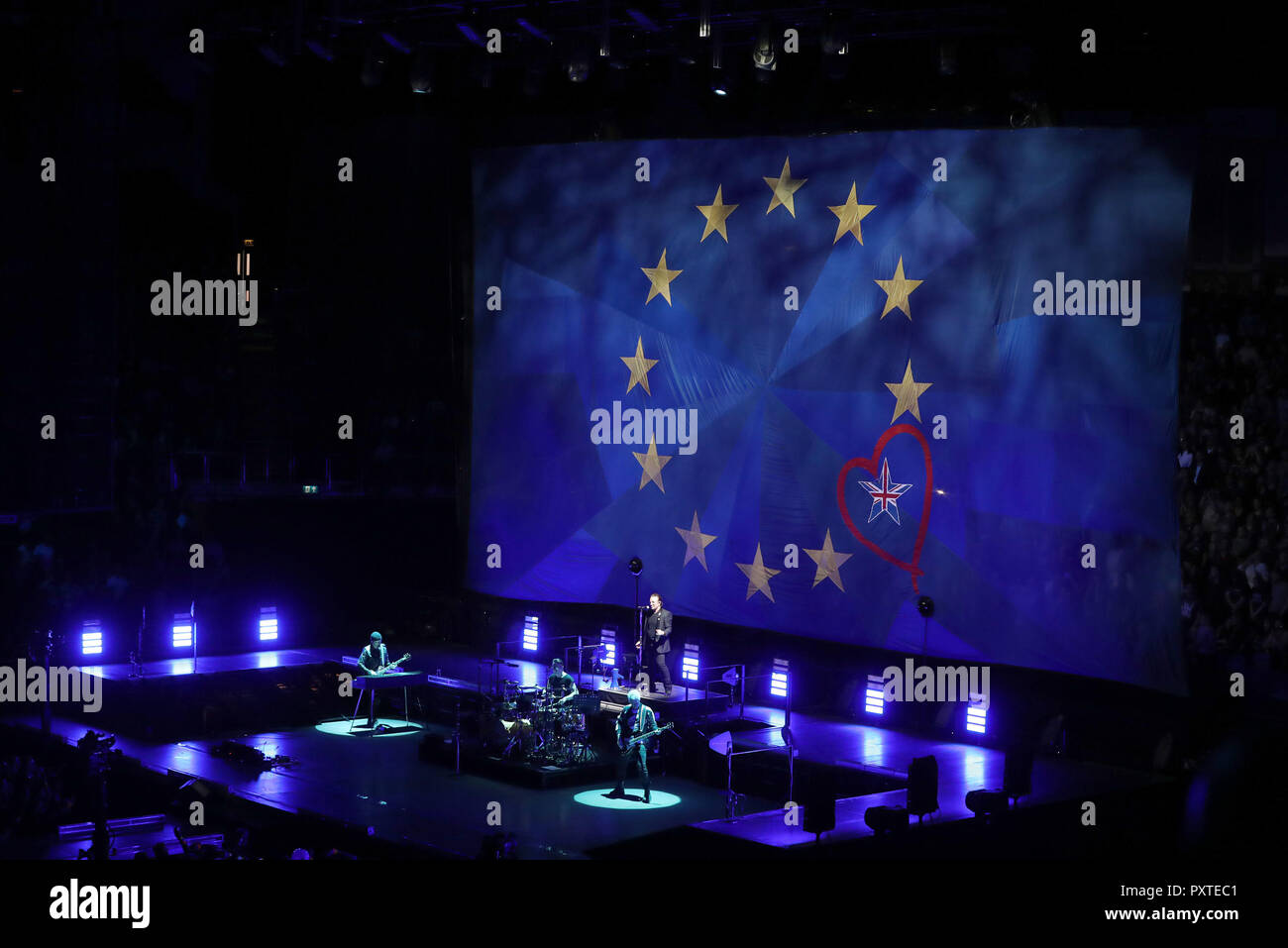 U2 perform in front of a giant EU flag, with one star as the Union Flag, at the o2 Arena in London, during their eXPERIENCE + iNNOCENCE Tour. Stock Photo