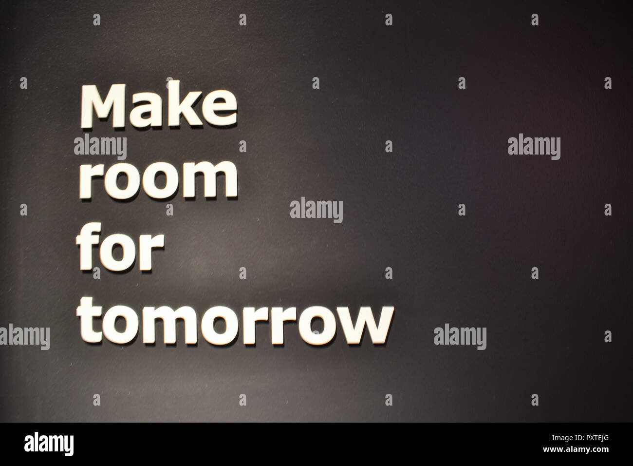 Written sign on single color background Stock Photo - Alamy