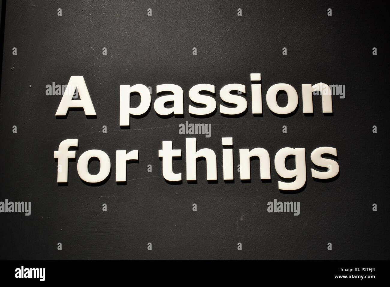 Written sign on single color background Stock Photo - Alamy