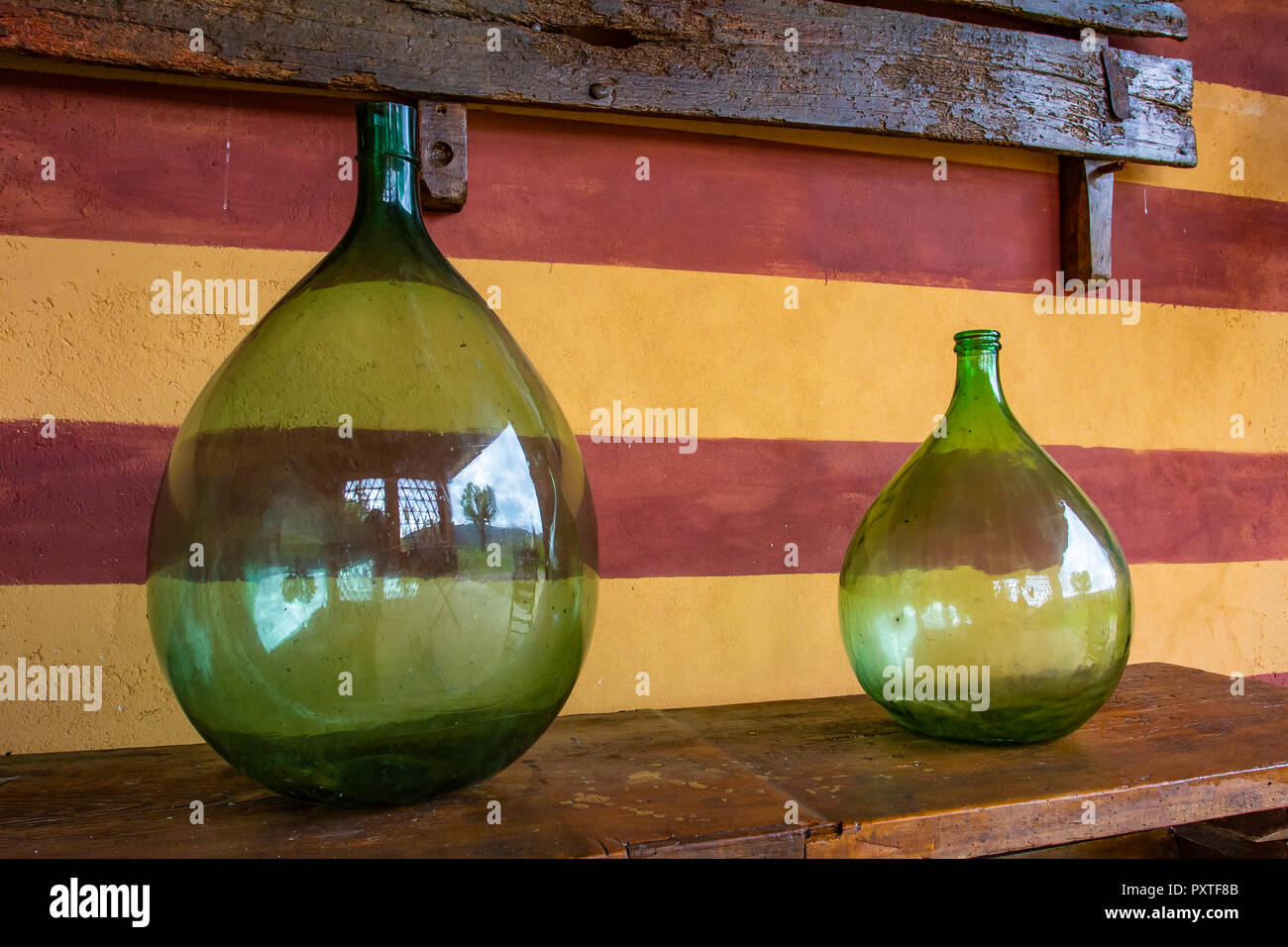 Vintage large wine bottles. Wine cellar, storage of wine Stock Photo Alamy
