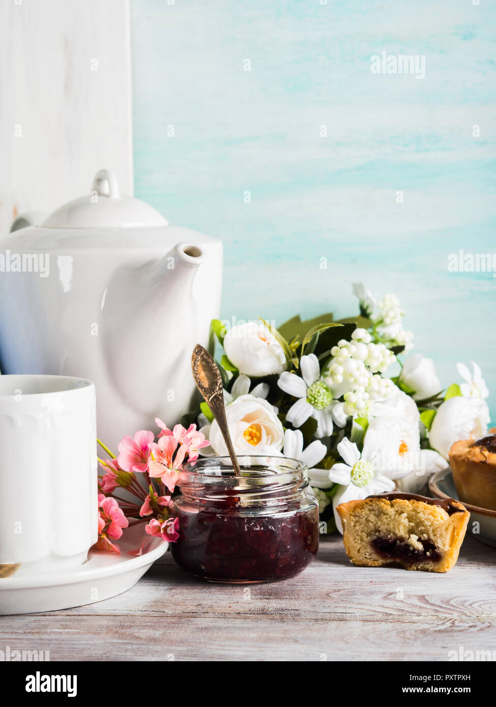 Cakes with frangipane, cherry jam and chocolate frosting. Romantic