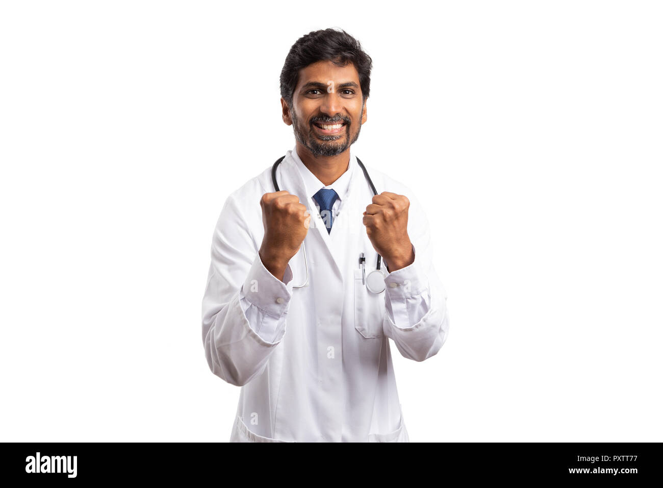 Successful indian male medic with please expression holding hands in ...