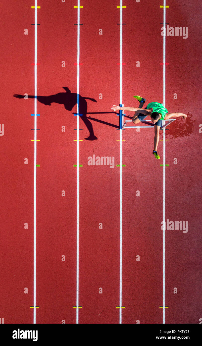 Aerial view of hurdler Stock Photo Alamy