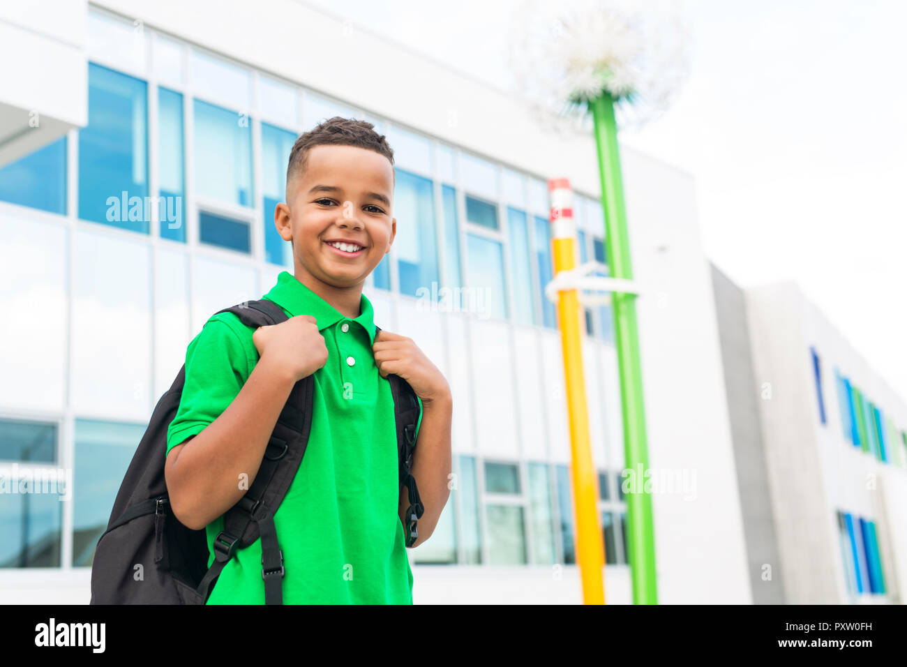cheerful african american primary school boy with backpack Stock Photo ...