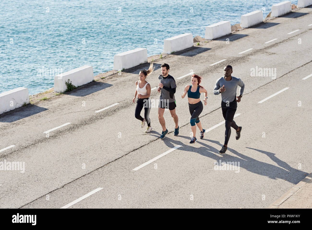 Group of people jogging Stock Photo