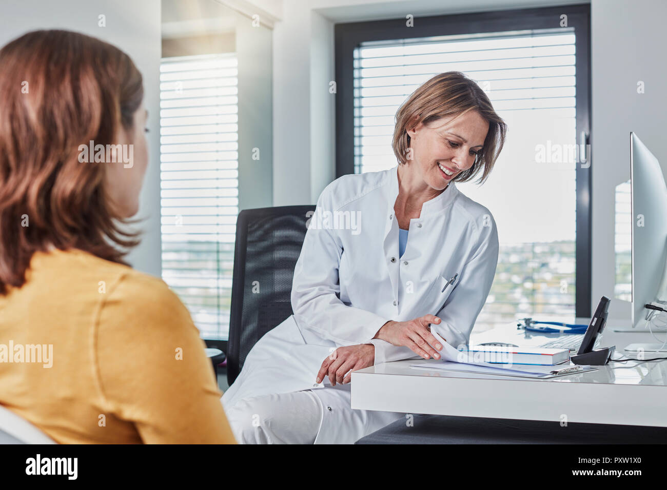 Physician patient talk Stock Photo