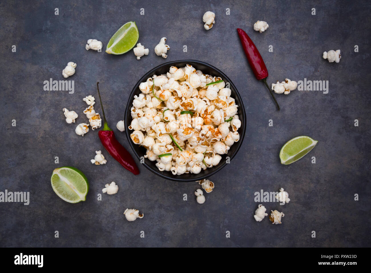 Bowl with popcorn flavoured with chili and lime Stock Photo