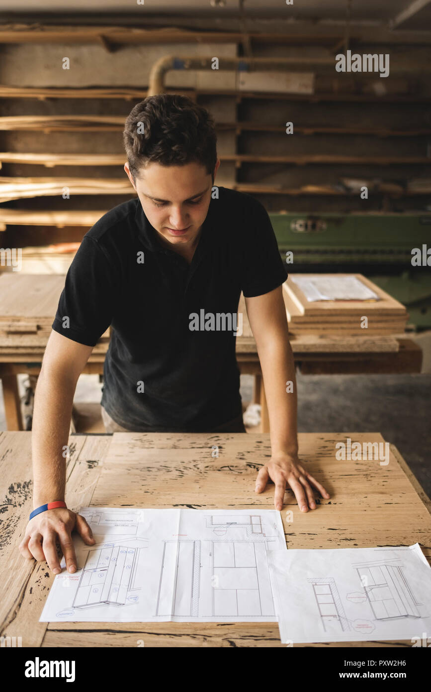Carpenter in reading plan Stock Photo Alamy