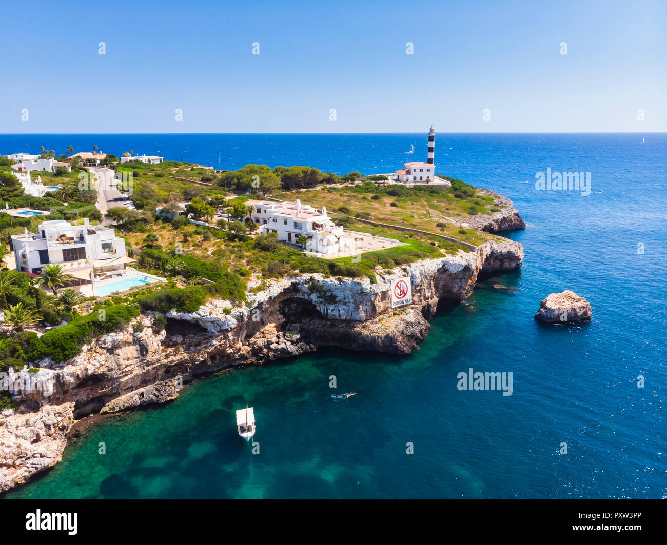 Spain, Mallorca, Portocolom, Punta de ses Crestes, Bay of Portocolom, Lighthouse Stock Photo