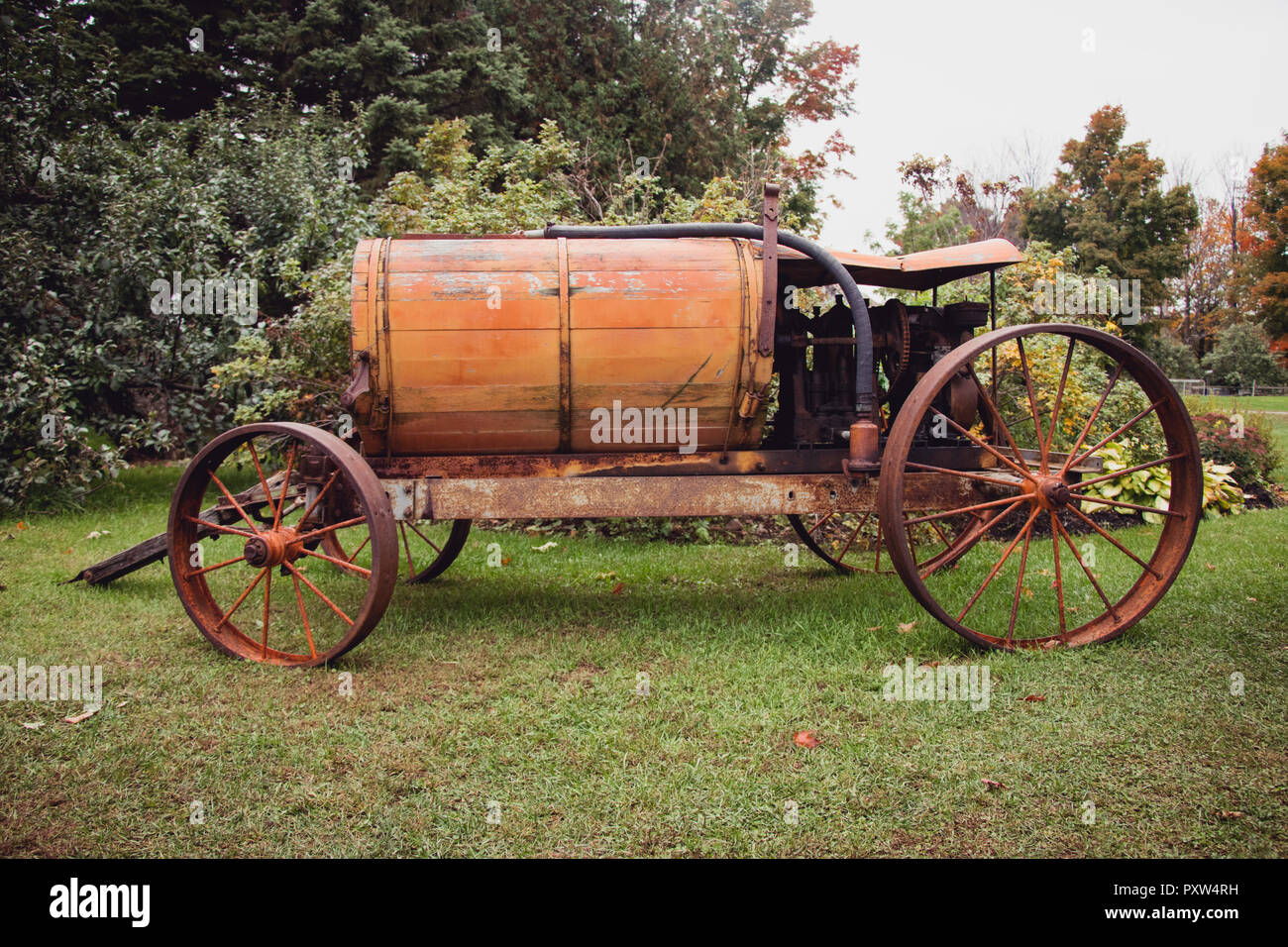 Orchard equipment - Antique carriage with sprayer pump Stock Photo