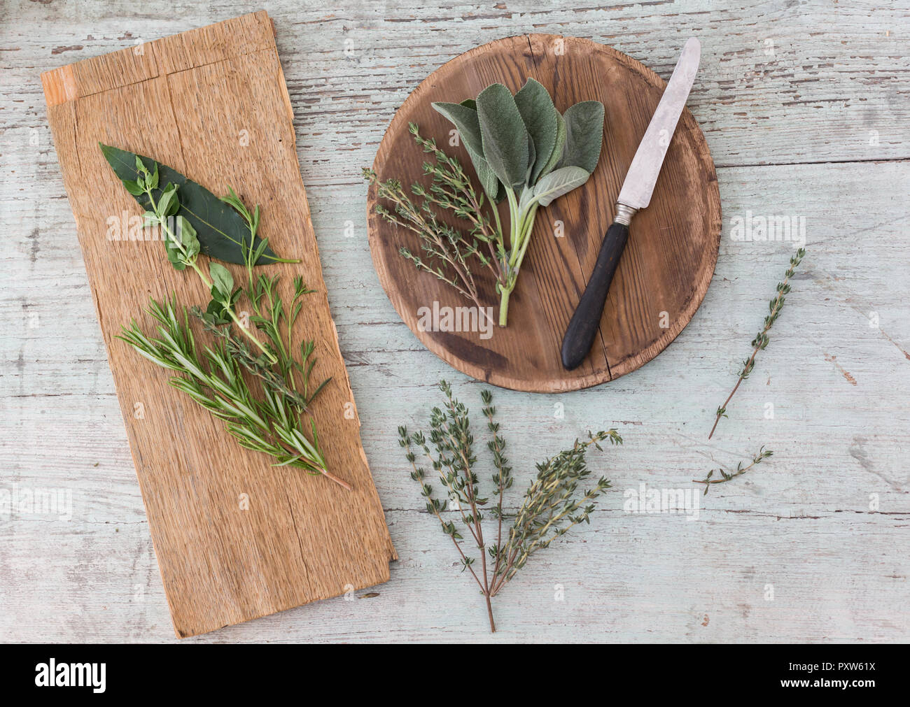 Fresh Provencal herbs, knife and   wooden boards Stock Photo