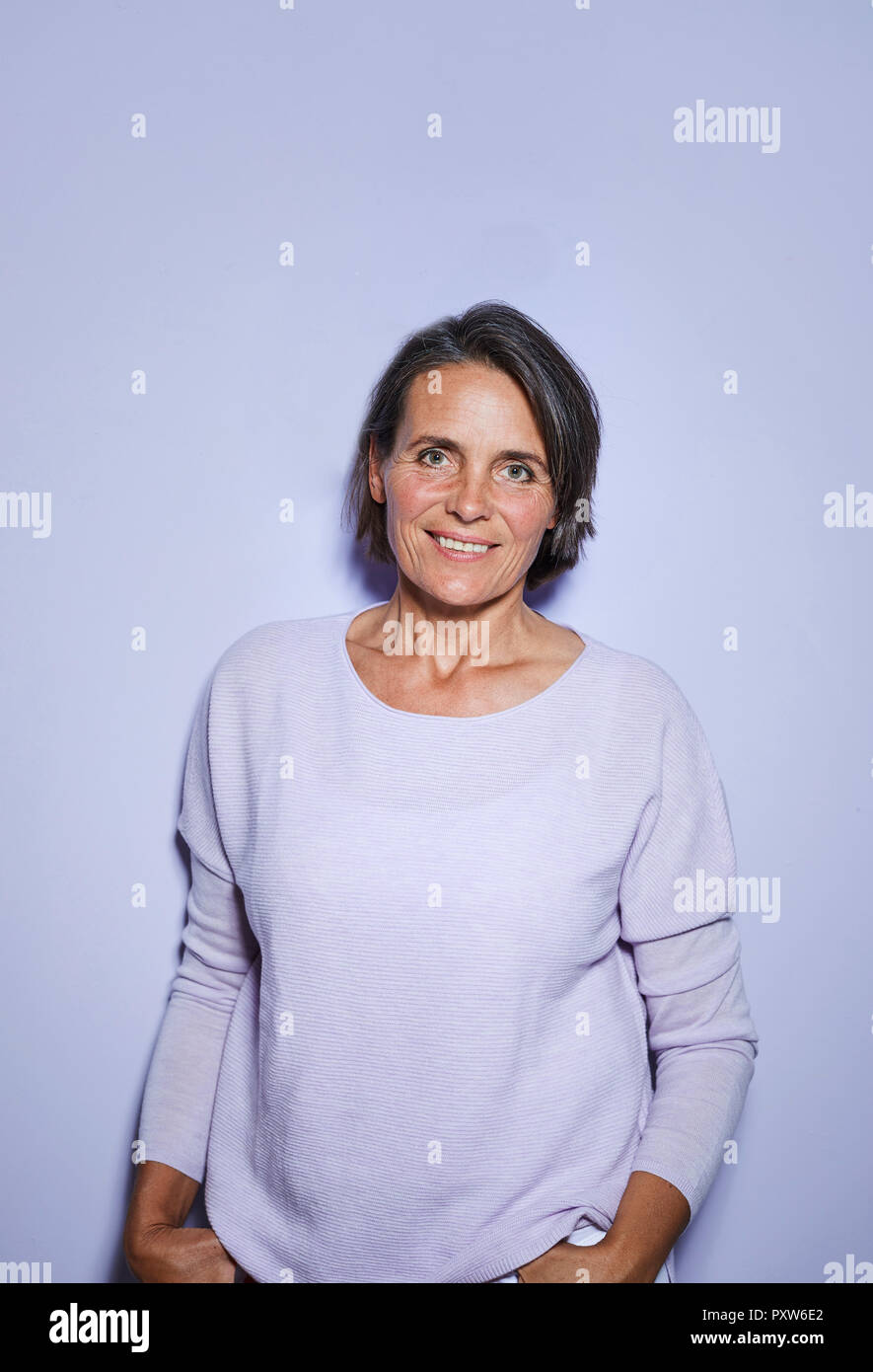 Portrait of smiling mature woman Stock Photo - Alamy
