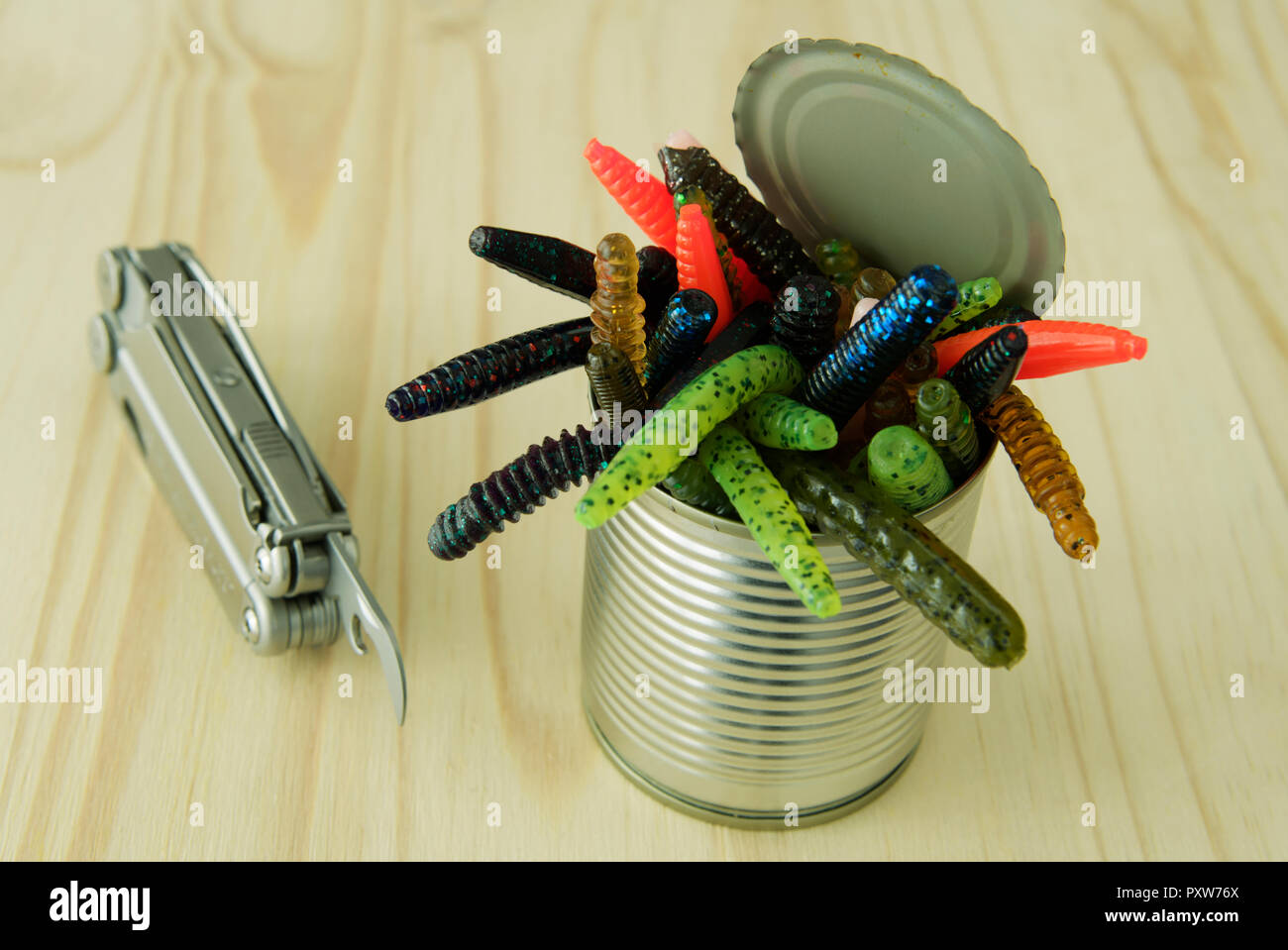 Close-up, detail, multi-tool, can of worms, crawling, background, abstract, tin, can opener Stock Photo