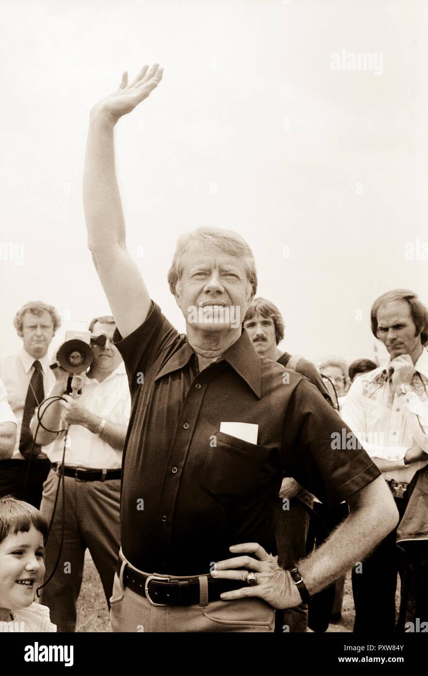 Jimmy Carter waves goodbye to John Glenn at the Plains, Georgia airport after interviewing him as a possible vice presidential running mate. Stock Photo