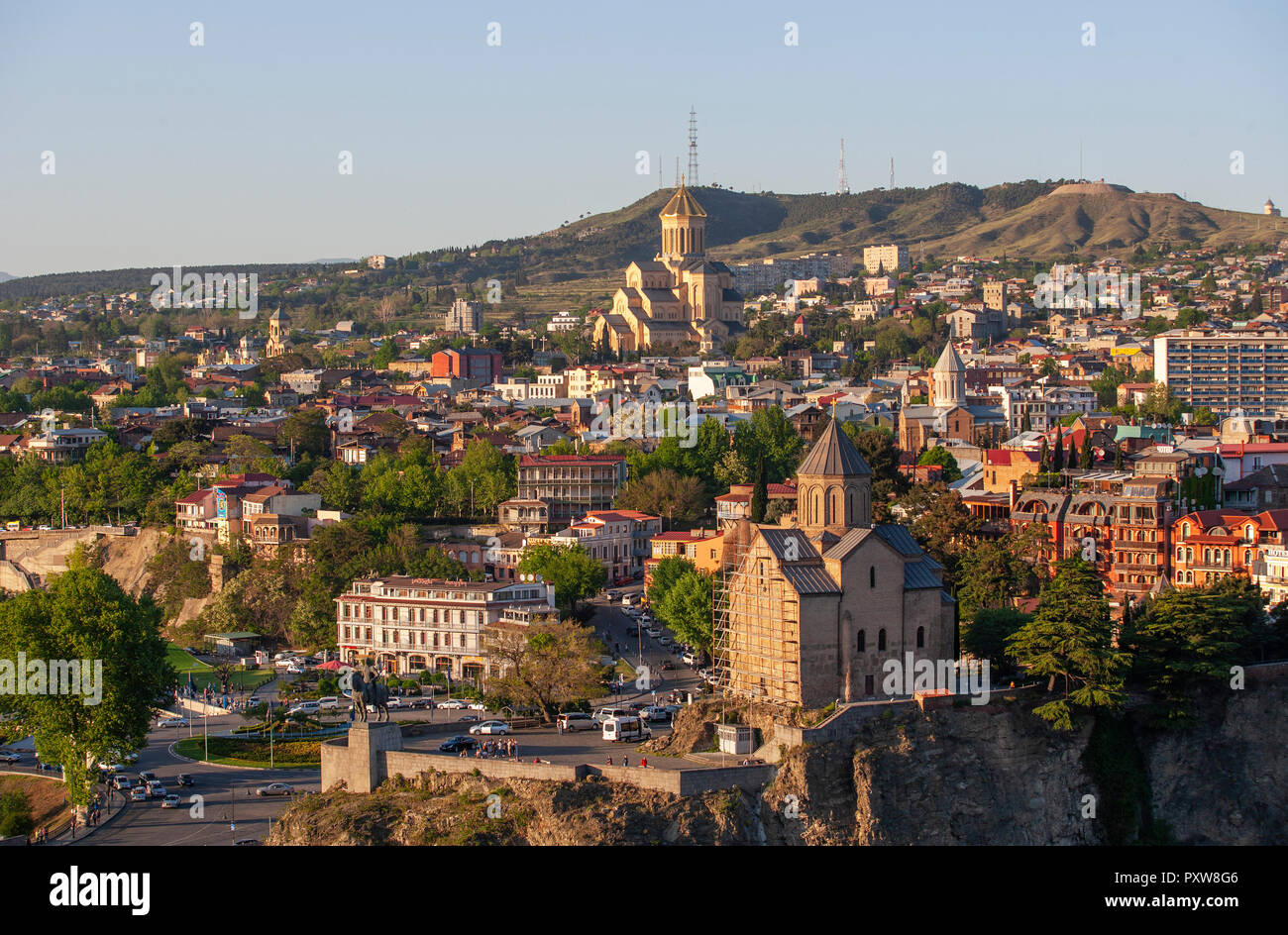 Georgia, Tbilisi, Kura river and Sameba Cathedral in old town Stock Photo